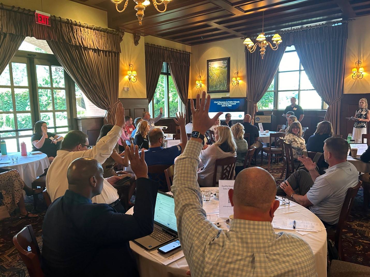 PK-12 Council attendees raising their hand